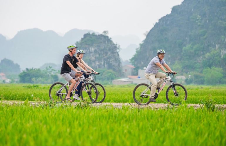 Cycling a bike to explor rural Ninh Binh beauty