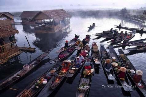 Get ready to immerse yourself in the vibrant tapestry of life as we take you to the bustling "5-Day Market" on the Inle Lake Boat Tour