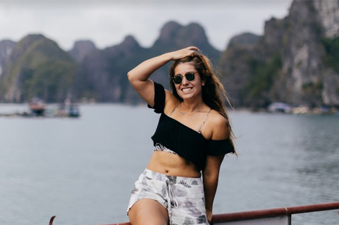 Capture the beautiful figure of you on the background of Halong Bay