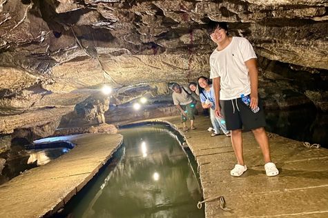 Tourist visiting Sung Sot Cave in Halong Bay
