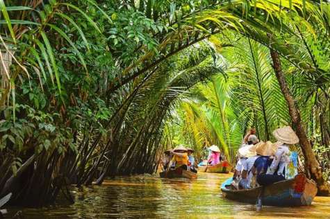 visitors joining Mekong Delta boat trip on Ham Luong River